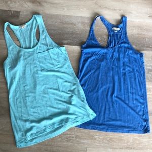 2 women’s razor back tank tops